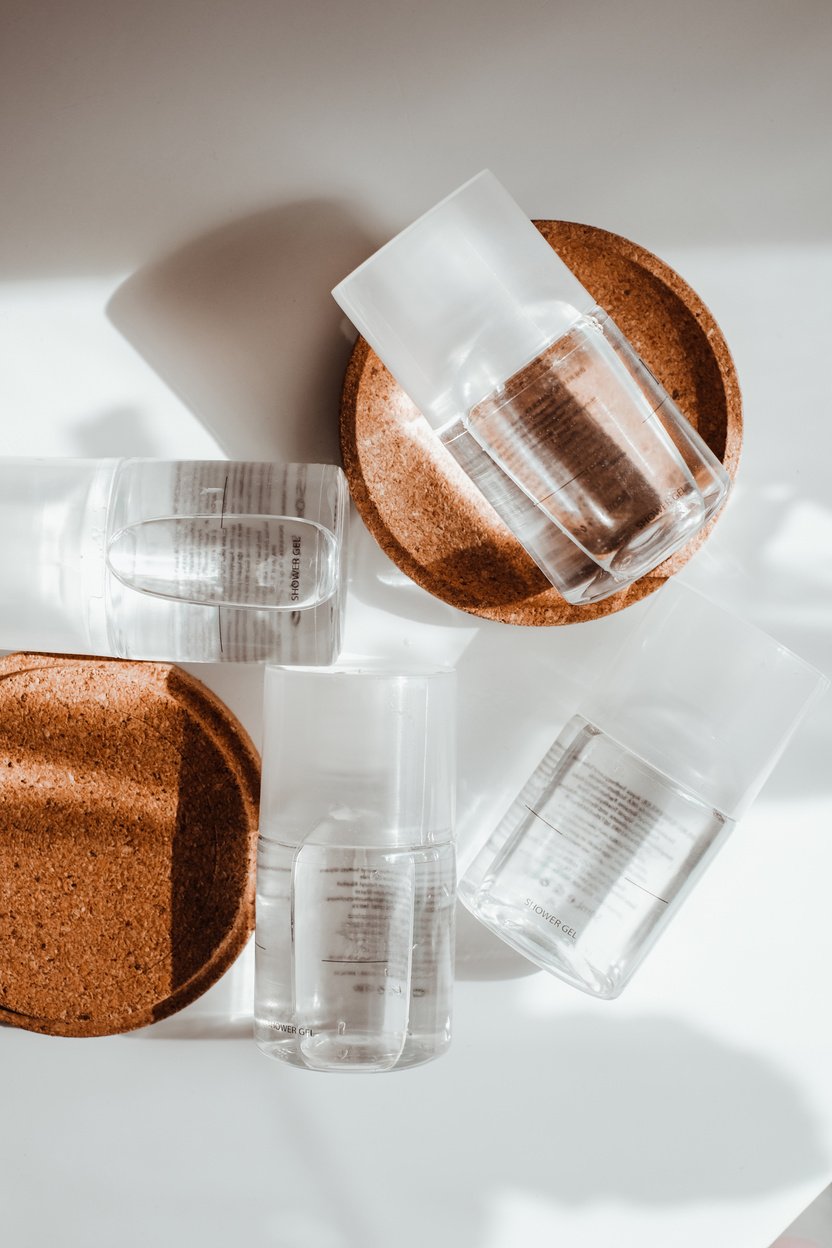 Small Clear Bottles on White Background